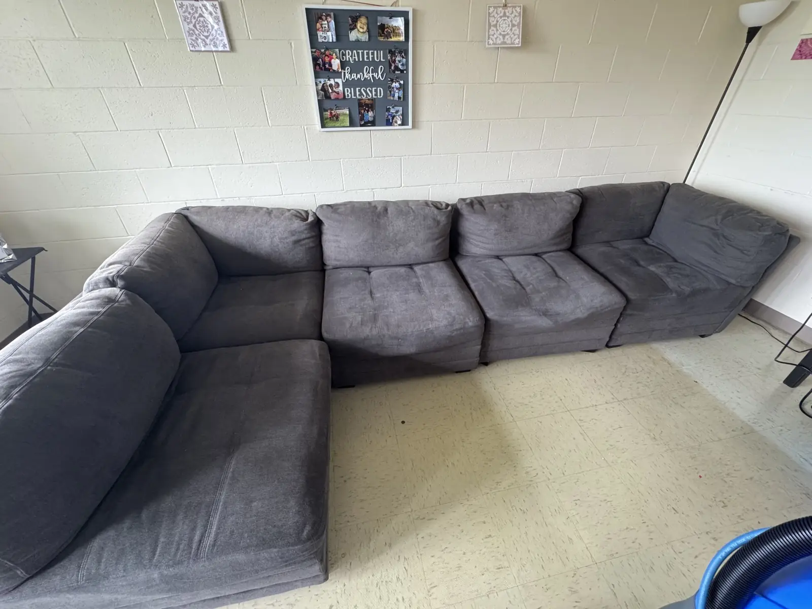 Gray modular sectional — before cleaning