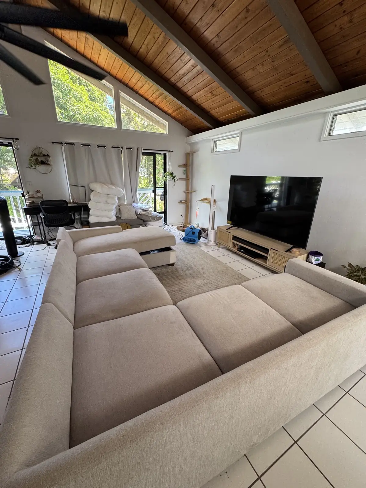 Beige U-shaped sectional — before cleaning